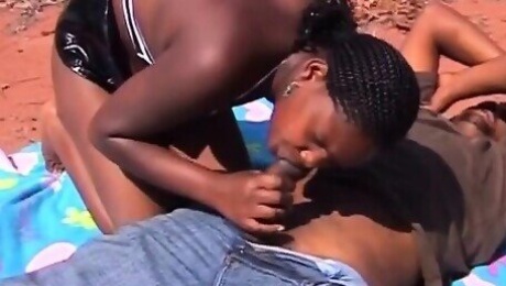 Busty African slaves sucking off masters outdoors