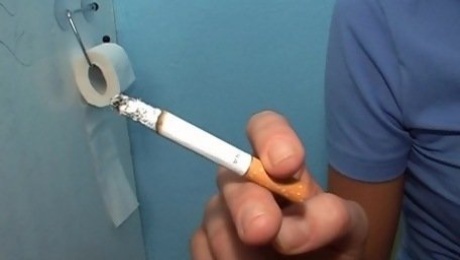 Smoking blonde in glory hole porn