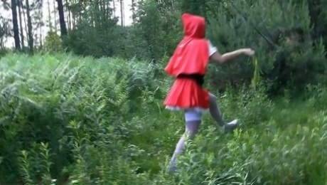 Horn-mad Red Riding Hood has ay idea to have sex in the woods